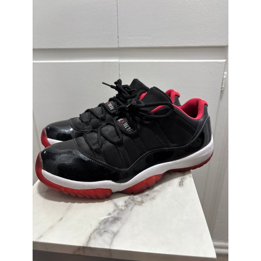 Air Jordan 11 Retro Low Bred Mens Size 11 Black True Red Patent Leather